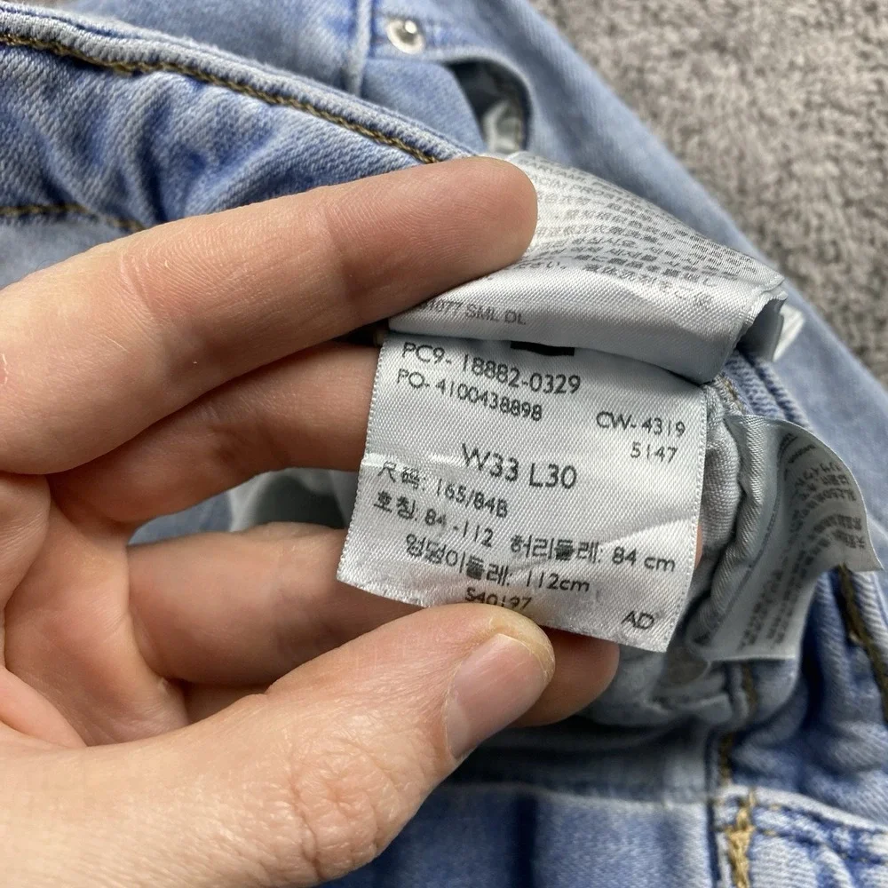 Levis 721 High Rise Skinny Jeans Womens 33 Blue Light Wash High Rise‎ Distressed